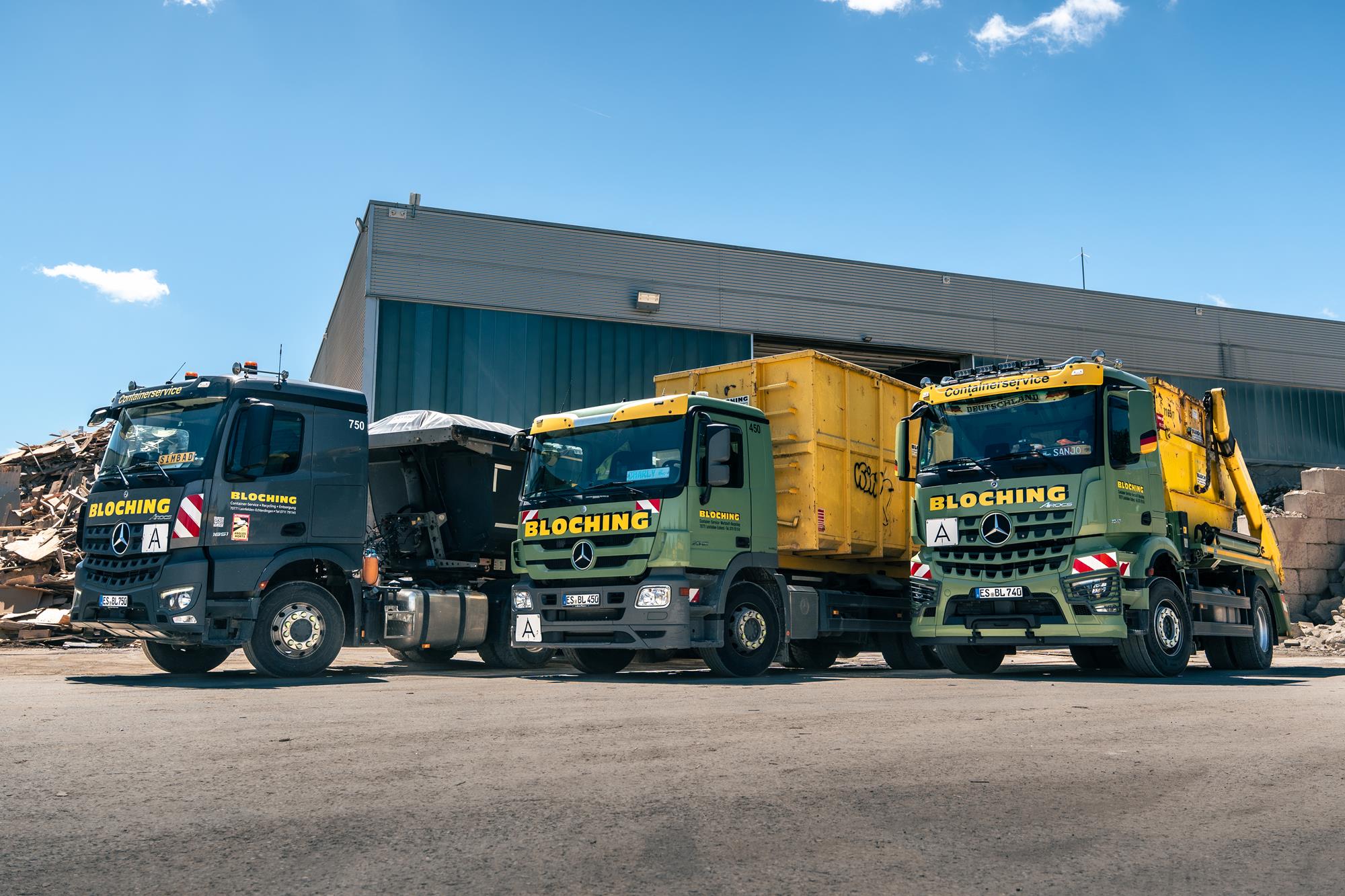 Fahrzeuge mit Container von Bloching